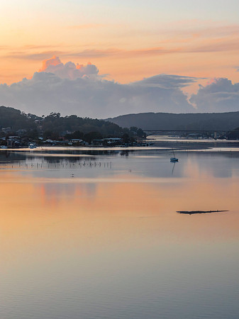 Soft and subtle sunrise waterscape over the bay