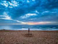 Sunrise at the Seaside with rain clouds