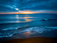Sunrise at the Seaside with rain clouds