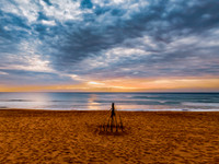Sunrise at the Seaside with rain clouds