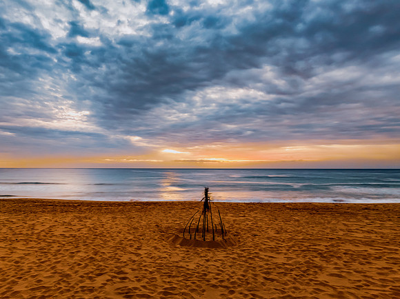 Sunrise at the Seaside with rain clouds