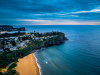 Sunrise at the Seaside with rain clouds