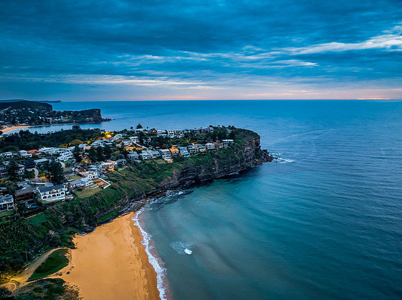 Sunrise at the Seaside with rain clouds