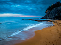 Sunrise at the Seaside with rain clouds