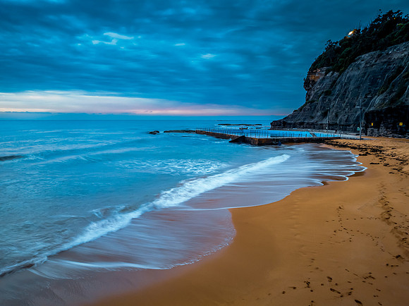 Sunrise at the Seaside with rain clouds