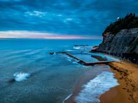 Sunrise at the Seaside with rain clouds