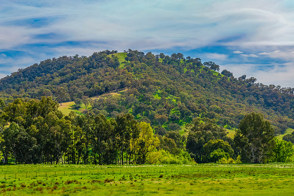 Riverina Countryside in Spring – Green Hills Under Clouded Ski