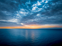 Sunrise at the Seaside with rain clouds