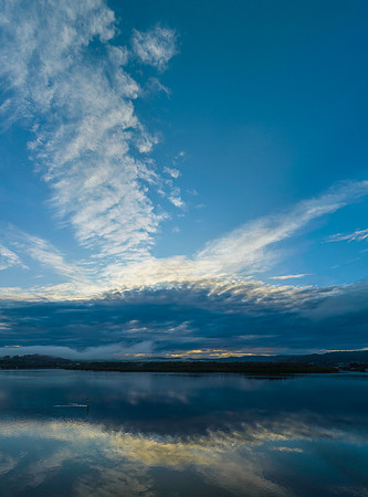 Respite from the rain - Bay waterscape with reflections
