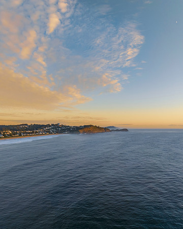 Sunrise over the ocean with rocks