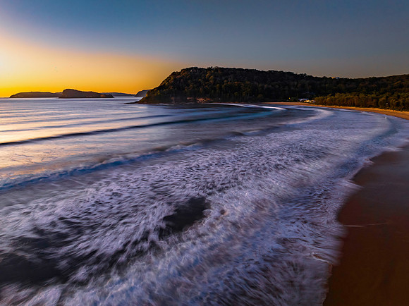 Clear skies aerial sunrise seascape