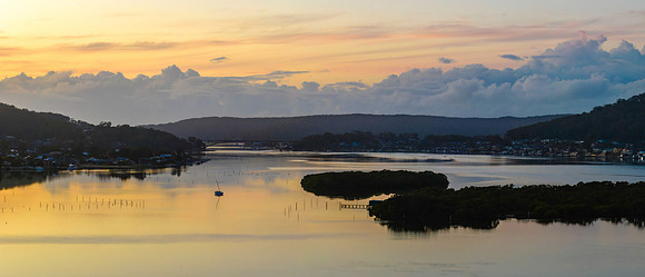 Soft and subtle sunrise waterscape over the bay