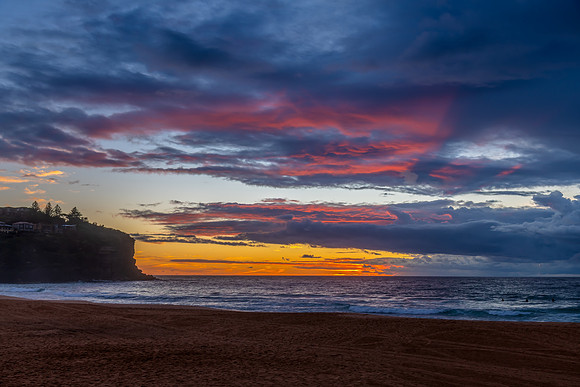 Sunrise at the Seaside with rain clouds