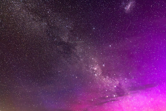 A Pink Aurora Australis and the Milky Way Shimmers in the Night