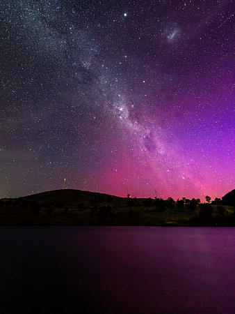 A Pink Aurora Australis and the Milky Way Shimmers in the Night