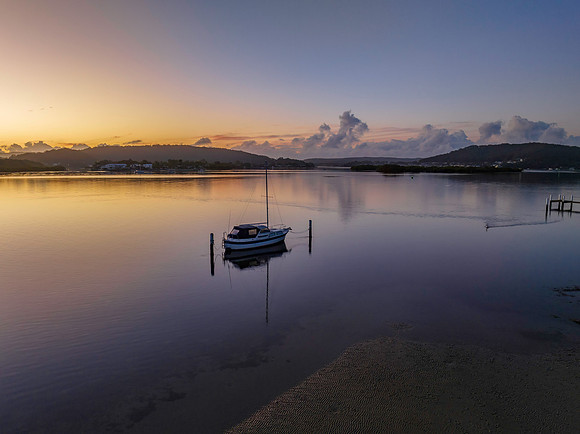 Soft and subtle sunrise waterscape over the bay