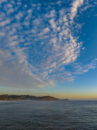 Sunrise over the ocean with rocks