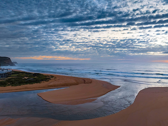Beautiful sunrise with clouds over the ocean