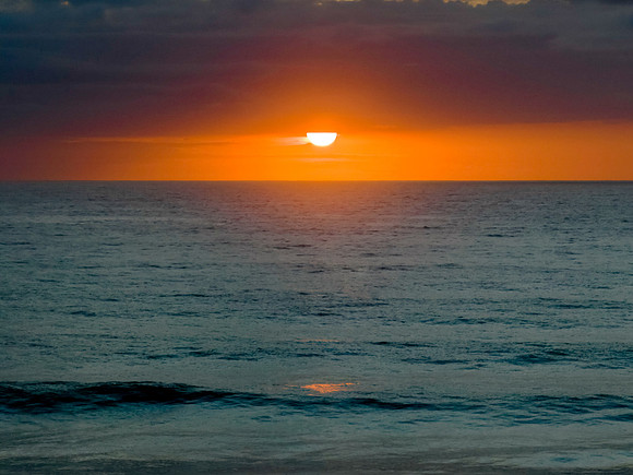 Beautiful sunrise with clouds over the ocean