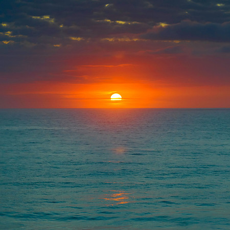 Beautiful sunrise with clouds over the ocean