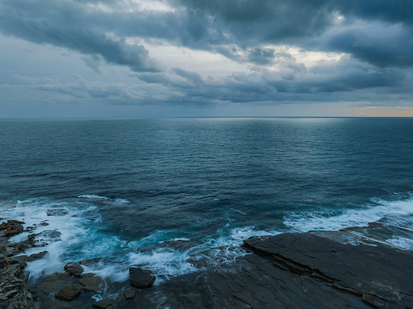 Sunrise over the sea and rocky Inlet