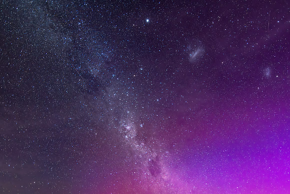A Pink Aurora Australis and the Milky Way Shimmers in the Night