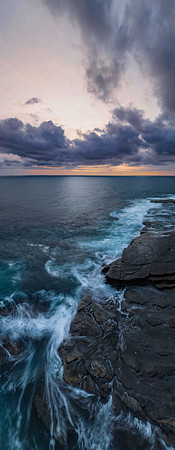 Sunrise over the sea and rocky Inlet