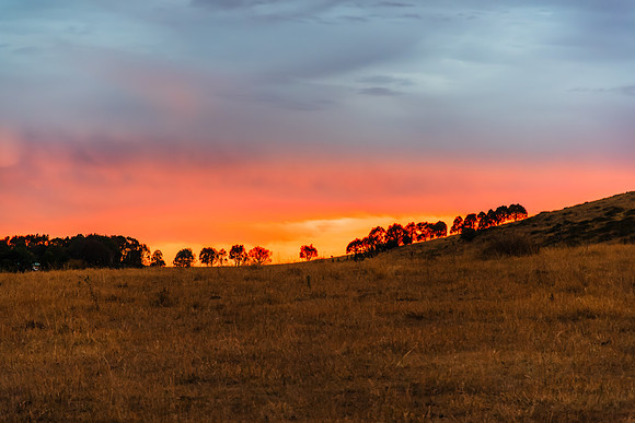 Twilight Sky with Passing Rain Clouds over the Countryside