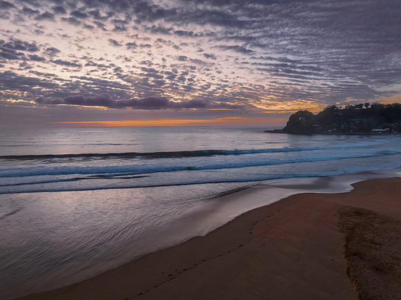 Beautiful sunrise with clouds over the ocean