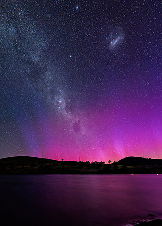 A Pink Aurora Australis and the Milky Way Shimmers Over the Dam