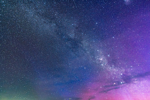 A Pink Aurora Australis and the Milky Way Shimmers in the Night