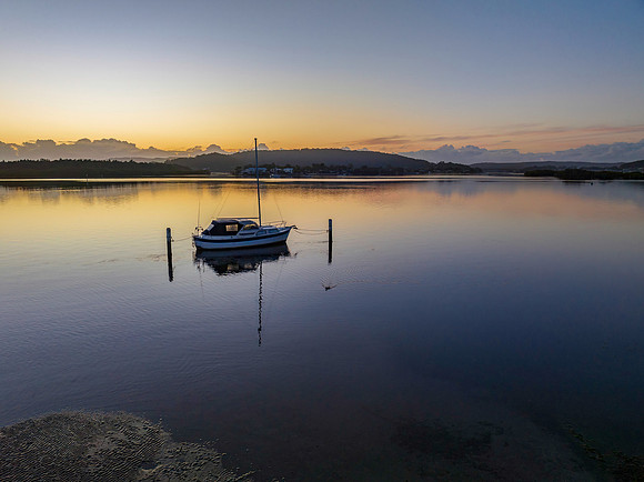 Soft and subtle sunrise waterscape over the bay