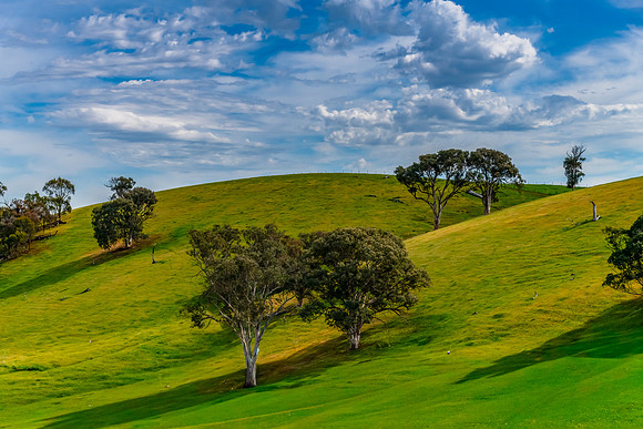 Riverina Countryside in Spring – Rolling Hills Under Clouded S