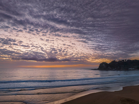 Beautiful sunrise with clouds over the ocean