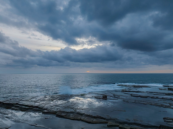 Sunrise over the sea and rocky Inlet