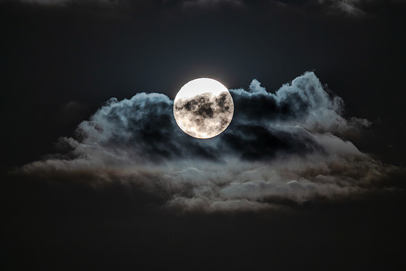 April’s Full Moon rising amonst the clouds
