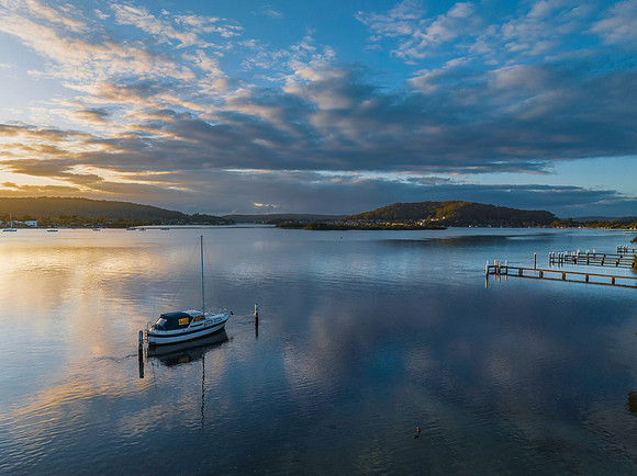 Early morning light over the bay with clouds