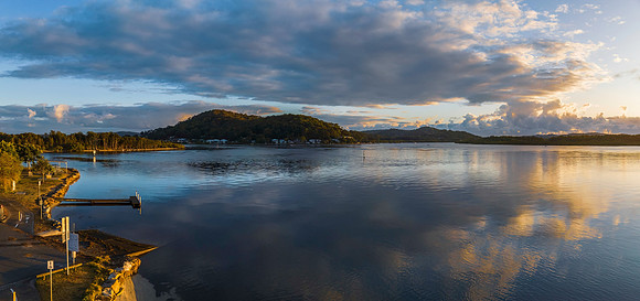 Early morning panorama over the bay with clouds