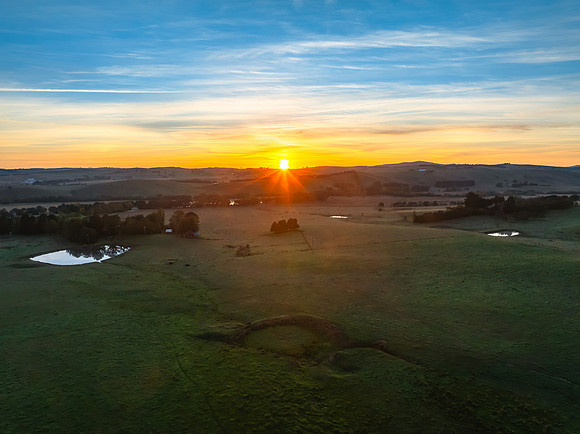 High-Cloud Sunrise Over Rural Landscapes on the Edge of a Countr