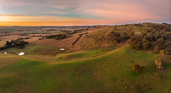 High-Cloud Sunrise Over Rural Landscapes on the Edge of a Countr