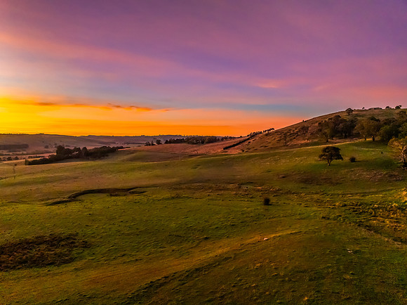 High-Cloud Sunrise Over Rural Landscapes on the Edge of a Countr