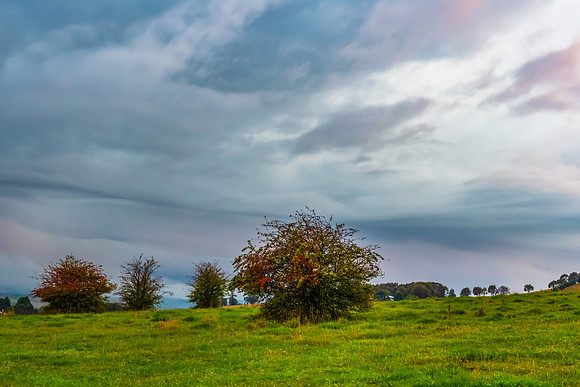 Sunset and stormy skies over the rural countryside