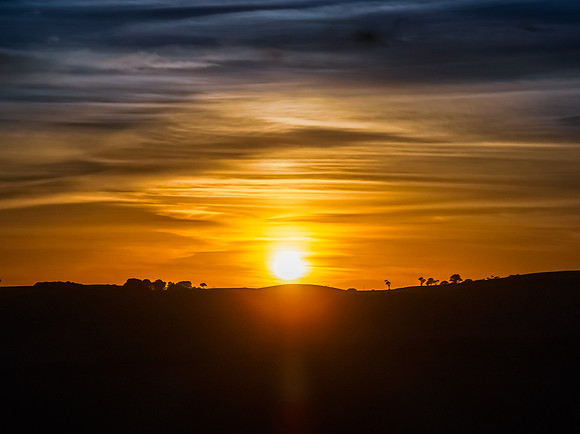 High-Cloud Sunrise Over Rural Landscapes on the Edge of a Countr