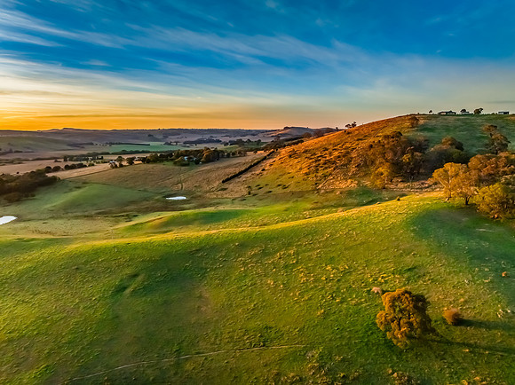 High-Cloud Sunrise Over Rural Landscapes on the Edge of a Countr