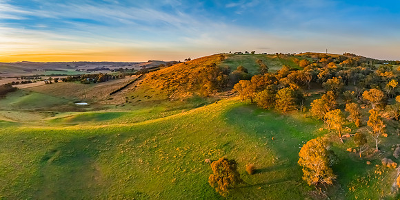 High-Cloud Sunrise Over Rural Landscapes on the Edge of a Countr