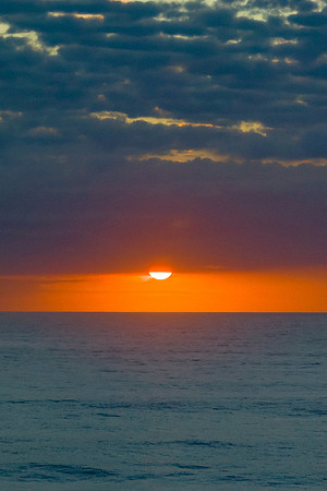 Beautiful sunrise with clouds over the ocean