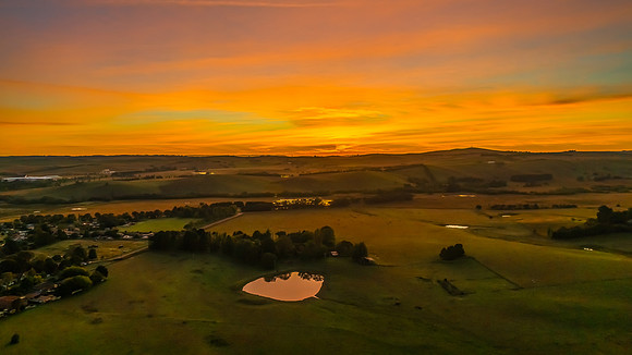 High-Cloud Sunrise Over Rural Landscapes on the Edge of a Countr