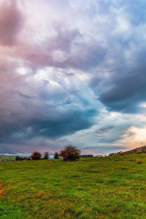 Sunset and stormy skies over the rural countryside