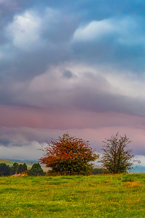 Sunset and stormy skies over the rural countryside