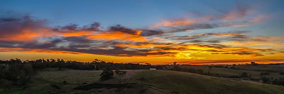 Soft Evening Light and High Cloud Over the Country Landscape